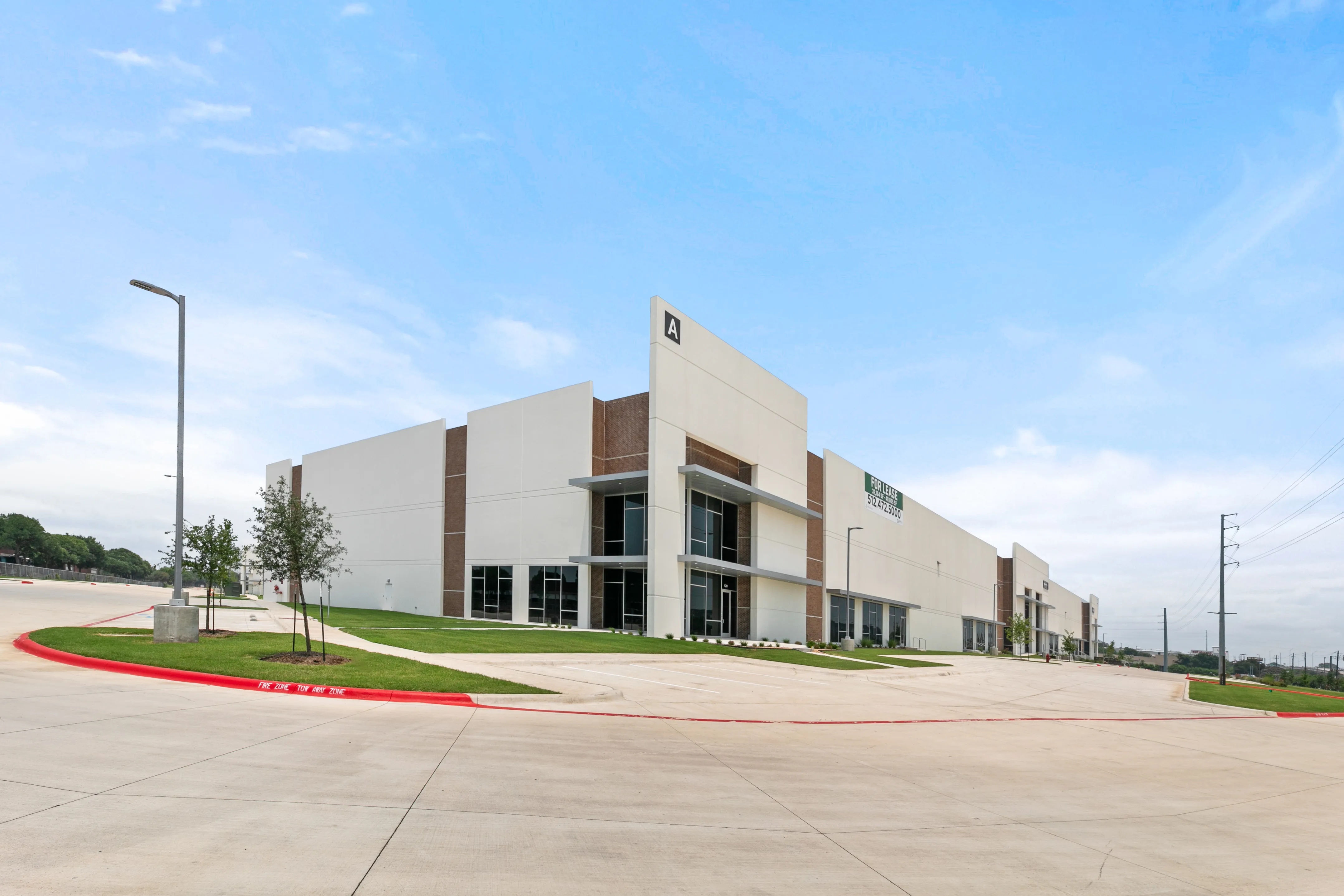 Completed Ben White Industrial Park entry and landscaped courtyard