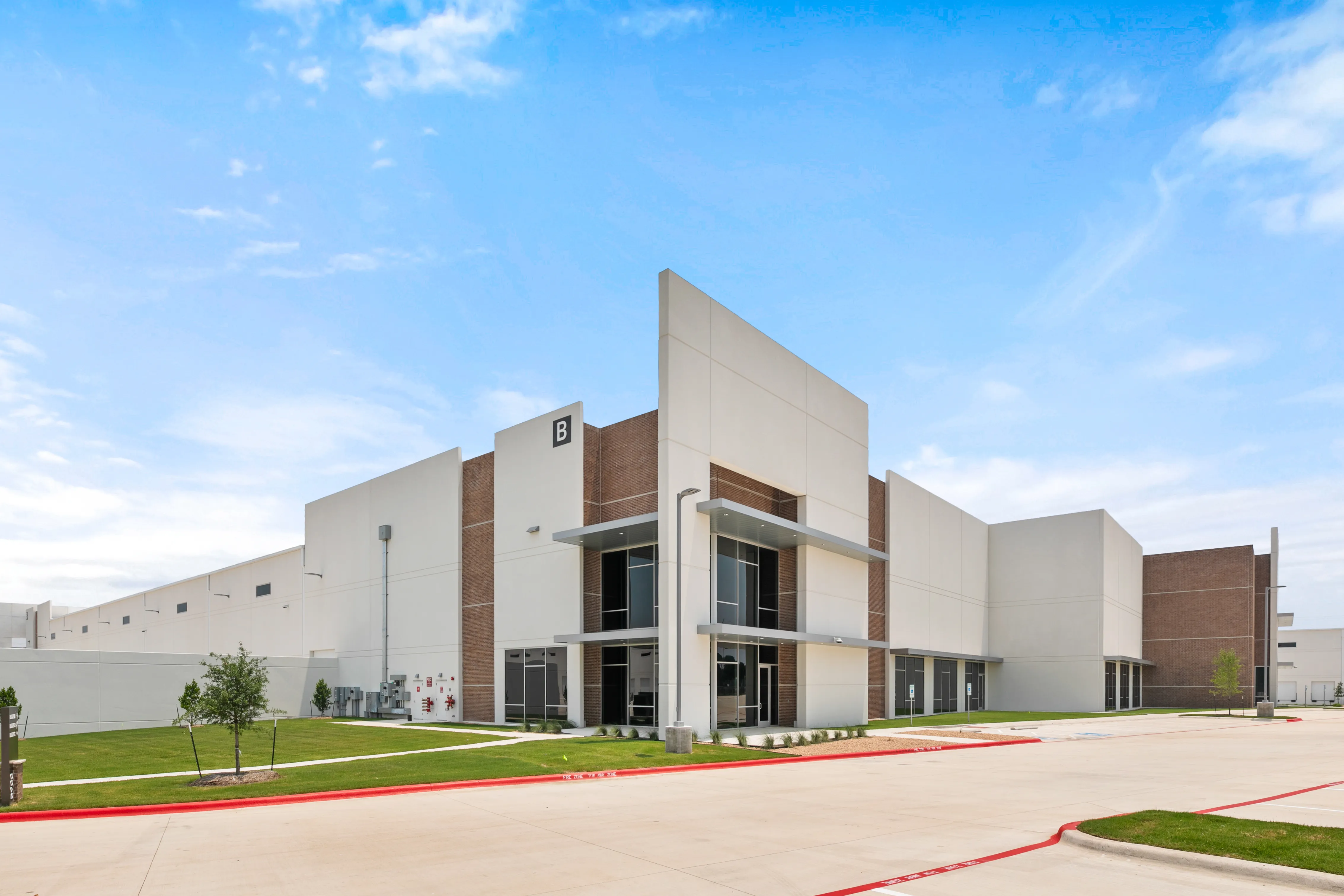 Angled exterior view of the main entrance at 5900 E Ben White