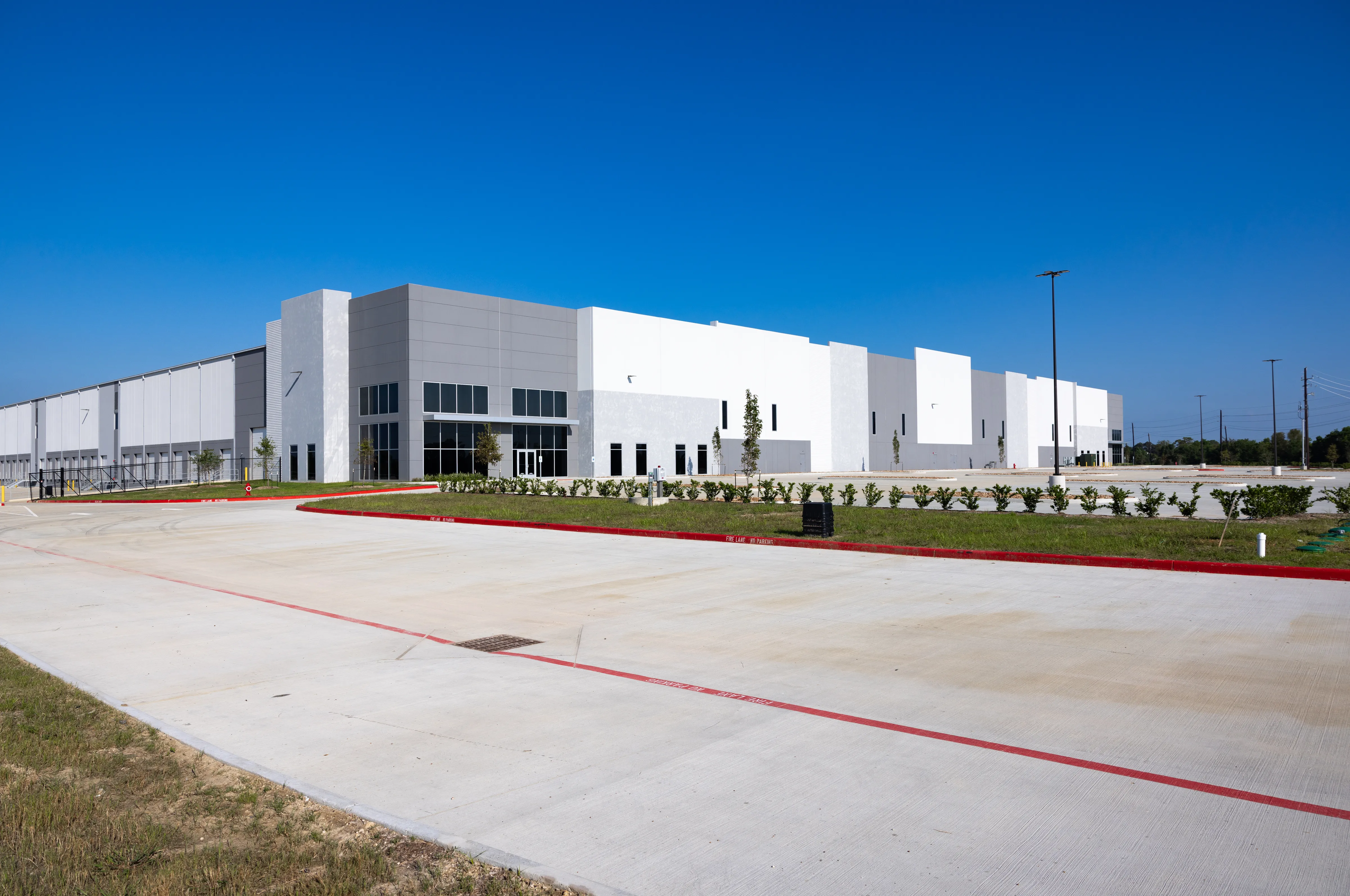 Wide exterior view of loading bays at Port 99